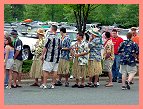 Grass Skirts in the Porta-Potty Line